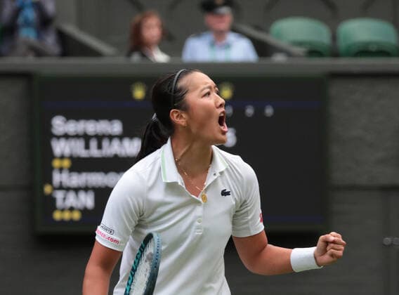 France s Harmony Tan in action in her first round match against American Serena Williams on day two of the 2022 Wimbledon championships in London on Tuesday, June 28, 2022.  LON2022062884 HUGOxPHILPOTT