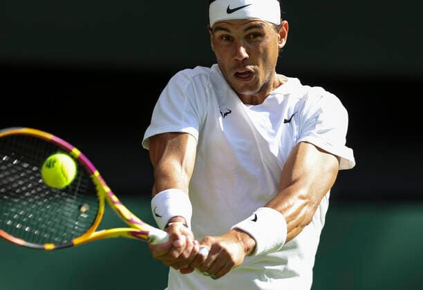 (220629) -- LONDON, June 29, 2022 -- Rafael Nadal hits a return during the men s singles first round match between Rafael Nadal of Spain and Francisco Cerundolo of Argentina at Wimbledon Tennis Championship in London, Britain, on June 28, 2022. ) (SP)BRITAIN-LONDON-TENNIS-WIMBLEDON-DAY 2 HanxYan 