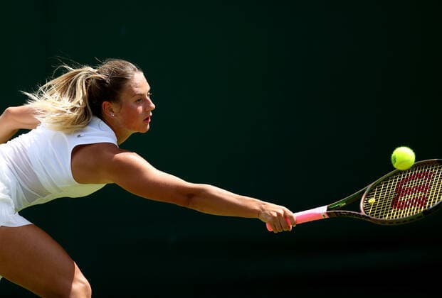 (220629) -- LONDON, June 29, 2022 -- Marta Kostyuk of Ukraine returns the shot during the women s singles 2nd round match against Zhang Shuai of China at Wimbledon Tennis Championship in London, Britain, June 29, 2022. ) (SP)BRITAIN-LONDON-TENNIS-WIMBLEDON LixYing 