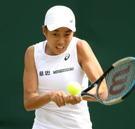 (220629) -- LONDON, June 29, 2022 -- Zhang Shuai of China returns the shot during the women s singles 2nd round match against Marta Kostyuk of Ukraine at Wimbledon Tennis Championship in London, Britain, June 29, 2022. ) (SP)BRITAIN-LONDON-TENNIS-WIMBLEDON LixYing 