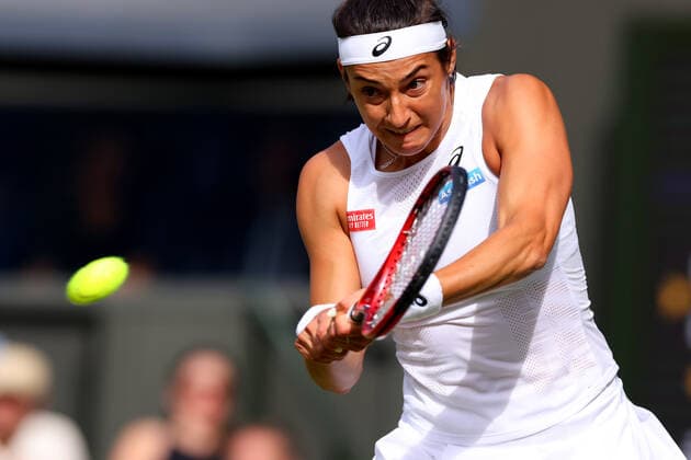 29th June 2022, All England Lawn Tennis and Croquet Club, London, England; Wimbledon Tennis tournament; Caroline Garcia plays a backhand to Emma Raducanu in the ladies singles  ActionPlus12402923 ShaunxBrooks