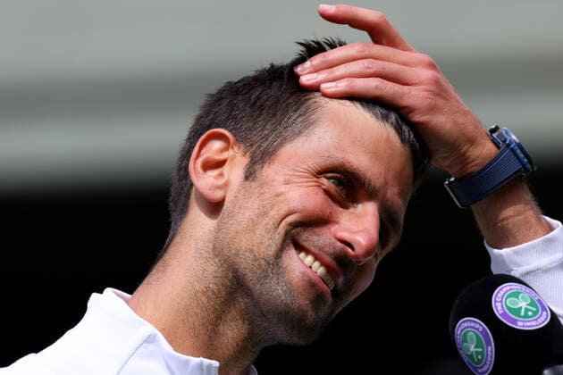 29th June 2022, All England Lawn Tennis and Croquet Club, London, England; Wimbledon Tennis tournament; Novak Djokovic smiles during his interview after winning his match against Thanasi Kokkinakis  ActionPlus12402984 ShaunxBrooks