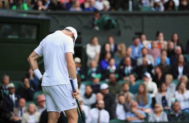 (220630) -- LONDON, June 30, 2022 -- Andy Murray of Britain reacts during the men s singles 2nd round match against John Isner of the United States at Wimbledon Tennis Championship in London, Britain, June 29, 2022. ) (SP)BRITAIN-LONDON-TENNIS-WIMBLEDON LixYing 