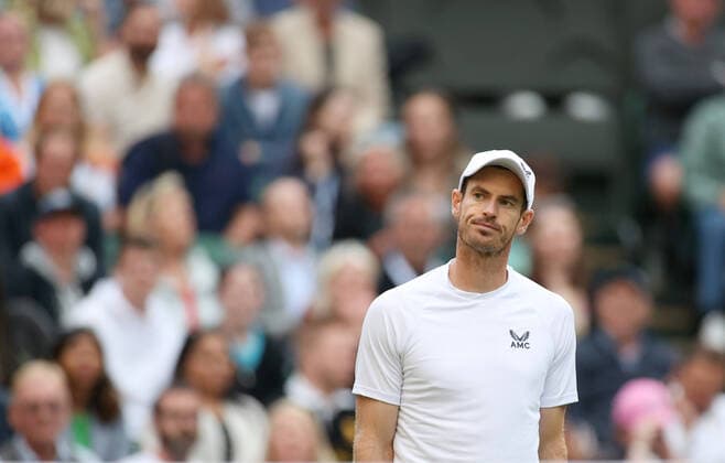 (220630) -- LONDON, June 30, 2022 -- Andy Murray of Britain reacts during the men s singles 2nd round match against John Isner of the United States at Wimbledon Tennis Championship in London, Britain, June 29, 2022. ) (SP)BRITAIN-LONDON-TENNIS-WIMBLEDON LixYing 