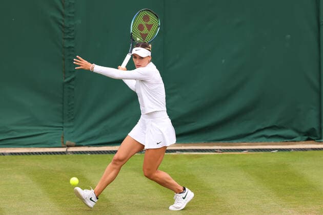 30th June 2022, All England Lawn Tennis and Croquet Club, London, England; Wimbledon Tennis tournament; Ana Bogdan plays a backhand to Petra Kvitova in the ladies singles  ActionPlus12403001 ShaunxBrooks