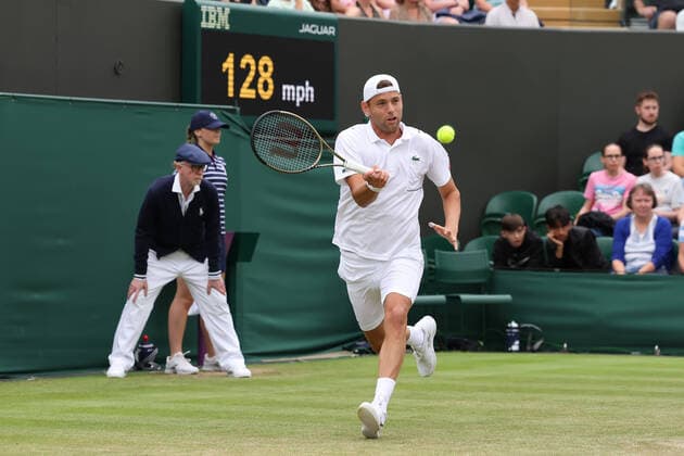 30th June 2022, All England Lawn Tennis and Croquet Club, London, England; Wimbledon Tennis tournament; Filip Krajinovic plays a forehand to Nick Kyrgios in the mens singles  ActionPlus12403033 ShaunxBrooks