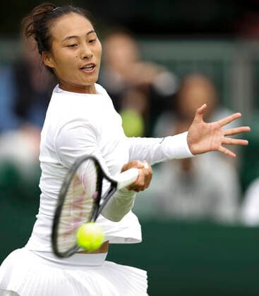 (220630) -- LONDON, June 30, 2022 -- Zheng Qinwen of China hits a return during the women s singles second round match against Greet Minnen of Belgium at Wimbledon tennis Championship in London, Britain, June 30, 2022. ) (SP)BRITAIN-LONDON-TENNIS-WIMBLEDON-WOMEN S SINGLES HanxYan 