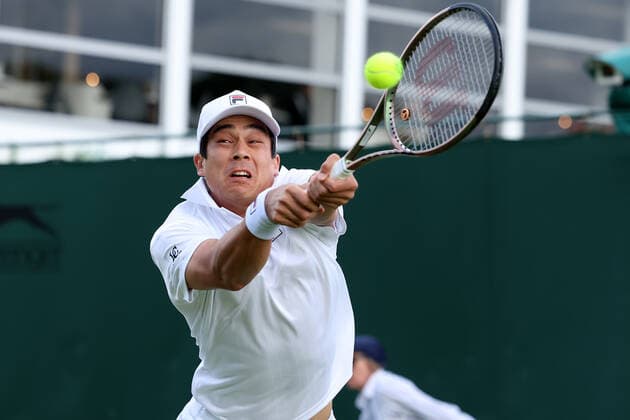 30th June 2022, All England Lawn Tennis and Croquet Club, London, England; Wimbledon Tennis tournament; Mackenzie McDonald plays a forehand to John Peers and Filip Polasek in the mens doubles  ActionPlus12403116 ShaunxBrooks