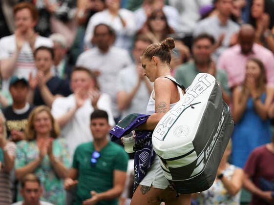 (220701) -- LONDON, July 1, 2022 -- Karolina Pliskova leaves the court after the women s singles second round match between Katie Boulter of Britain and Karolina Pliskova of the Czech Republic at Wimbledon Tennis Championship in London, Britain, on June 30, 2022. ) (SP)BRITAIN-LONDON-TENNIS-WIMBLEDON-WOMEN S SINGLES HanxYan 