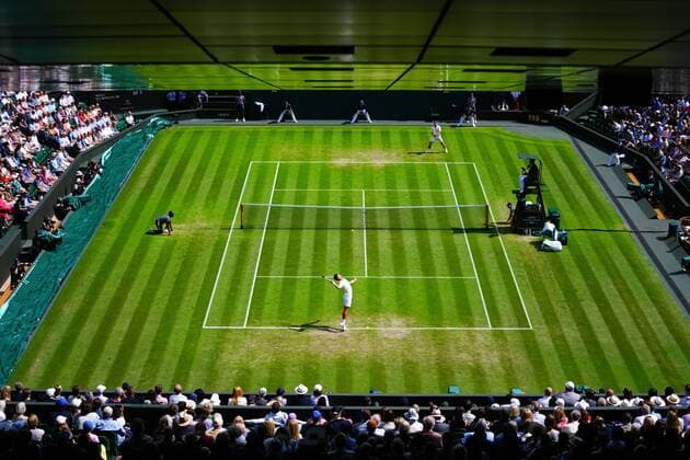 Mandatory Credit: Photo by Javier Garcia Shutterstock (13012399cd) Novak Djokovic and Miomir Kecmanovic during their third round match Wimbledon Tennis Championships, Day 5, The All England Lawn Tennis and Croquet Club, London, UK - 01 Jul 2022 Wimbledon Tennis Championships, Day 5, The All England Lawn Tennis and Croquet Club, London, UK - 01 Jul 2022  Copyright: xJavierxGarcia Shutterstockx 13012399cd