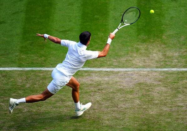 Mandatory Credit: Photo by Javier Garcia Shutterstock (13012399cx) Novak Djokovic during his third round match Wimbledon Tennis Championships, Day 5, The All England Lawn Tennis and Croquet Club, London, UK - 01 Jul 2022 Wimbledon Tennis Championships, Day 5, The All England Lawn Tennis and Croquet Club, London, UK - 01 Jul 2022  Copyright: xJavierxGarcia Shutterstockx 13012399cx
