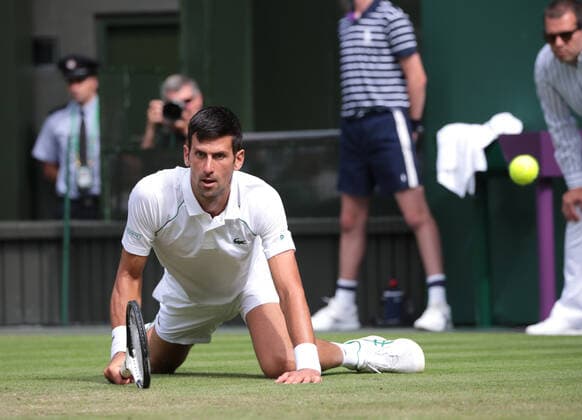 Serbian Novak Djokovic in action in his third round match against Serbian Miomir Kaomanovic on day five of the 2022 Wimbledon championships in London on Friday, July 01, 2022. Djokovic won the match 6-0,6-3,6-4.  LON202207035 HUGOxPHILPOTT