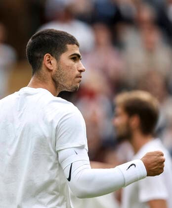 (220702) -- LONDON, July 2, 2022 -- Carlos Alcaraz celebrates after winning the men s singles third round match between Carlos Alcaraz of Spain and Oscar Otte of Germany at Wimbledon Tennis Championship in London, Britain, on July 1, 2022. ) (SP)BRITAIN-LONDON-TENNIS-WIMBLEDON-MEN S SINGLES HanxYan 