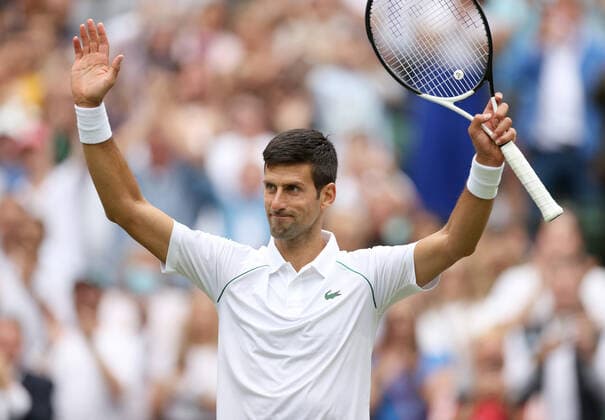 (220702) -- LONDON, July 2, 2022 -- Novak Djokovic celebrates victory after winning the men s singles third round match between Novak Djokovic of Serbia and Miomir Kecmanovic of Serbia at Wimbledon Tennis Championship in London, Britain, on July 1, 2022. ) (SP)BRITAIN-LONDON-TENNIS-WIMBLEDON-MEN S SINGLES LixYing 