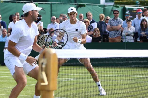 Great Britain, London, All England Lawn Tennis Club, The Championships Wimbledon 2022 - DAY 6- 02 07 2022 Belgian player Joran Vliegen and his doubles partner Jackson Withrow (USA) pictured during their second round double match in London , All England Lawn Tennis Club at The Championships Wimbledon 2022 The Championships Wimbledon 2022- DAY 6- 02 07 2022 PhotoNews Panoramic 
