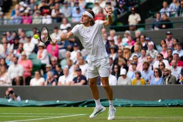 Mandatory Credit: Photo by Dave Shopland Shutterstock (13012402gw) Stefanos Tsitsipas during his third round match Wimbledon Tennis Championships, Day 6, The All England Lawn Tennis and Croquet Club, London, UK - 02 Jul 2022 Wimbledon Tennis Championships, Day 6, The All England Lawn Tennis and Croquet Club, London, UK - 02 Jul 2022  Copyright: xDavexShopland Shutterstockx 13012402gw
