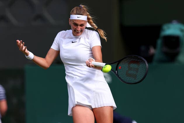 2nd July 2022, All England Lawn Tennis and Croquet Club, London, England; Wimbledon Tennis tournament; Petra Kvitova plays a forehand to Paula Badosa in the womens singles  ActionPlus12404214 ShaunxBrooks