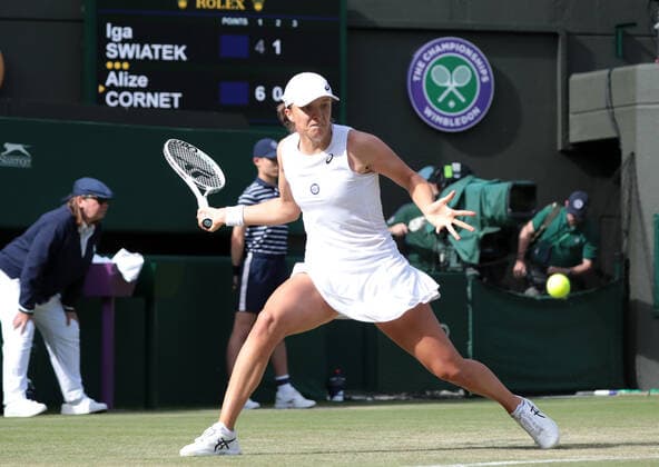 Polish Iga Swiatek in action in her third round match against French Alize Cornet on day six of the 2022 Wimbledon championships in London on Saturday, July 02, 2022. Cornet won the match 6-4,6-2.  LON2022070246 HUGOxPHILPOTT
