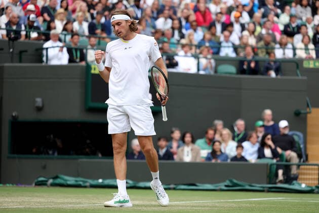 2nd July 2022, All England Lawn Tennis and Croquet Club, London, England; Wimbledon Tennis tournament; Stefanos Tsitsipas celebrates after he wins a point against Nick Kyrgios in the mens singles  ActionPlus12404349 ShaunxBrooks
