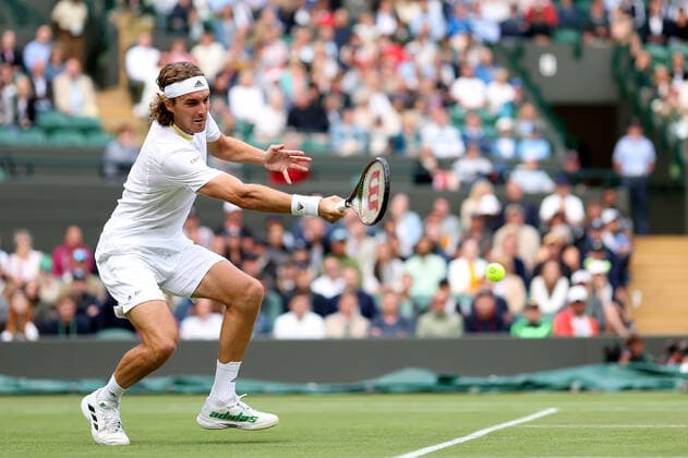 2nd July 2022, All England Lawn Tennis and Croquet Club, London, England; Wimbledon Tennis tournament; Stefanos Tsitsipas plays a forehand to Nick Kyrgios in the mens singles  ActionPlus12404354 ShaunxBrooks