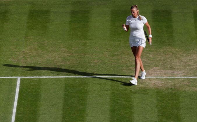 (220703) -- LONDON, July 3, 2022 -- Petra Kvitova celebrates scoring during the women s singles third round match between Petra Kvitova of the Czech Republic and Paula Badosa of Spain at Wimbledon Tennis Championship in London, Britain, on July 2, 2022. ) (SP)BRITAIN-LONDON-TENNIS-WIMBLEDON-WOMEN S SINGLES HanxYan 