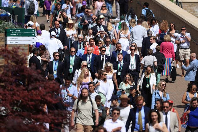 Tennis - Wimbledon (Day 7) 3rd July 2022 - Tennis - Wimbledon (Day 7) - Roger Federer (C) walks through the crowds - Photo: Simon Stacpoole Offside. London UK Copyright: xSimonxStacpoolexOffside