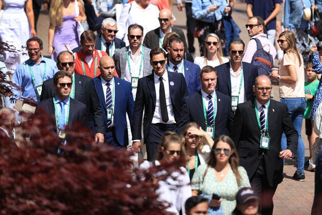 Tennis - Wimbledon (Day 7) 3rd July 2022 - Tennis - Wimbledon (Day 7) - Roger Federer (C) walks through the crowds flanked by security personnel - Photo: Simon Stacpoole Offside. London UK Copyright: xSimonxStacpoolexOffside