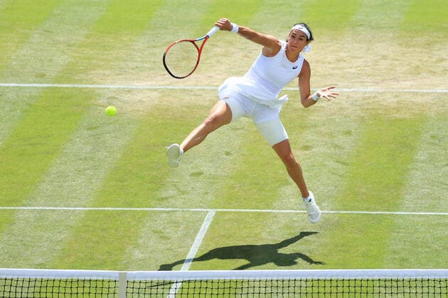 Tennis - Wimbledon (Day 7) 3rd July 2022 - Tennis - Wimbledon (Day 7) - Caroline Garcia (FRA) in action against Marie Bouzkova (CZE) during their Ladies Singles Round of 16 Round match - Photo: Simon Stacpoole Offside. London UK Copyright: xSimonxStacpoolexOffside