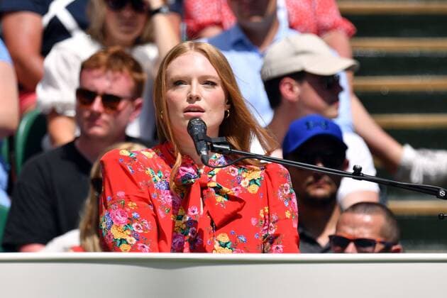 Mandatory Credit: Photo by James Veysey Shutterstock (13012856ak) Freya Ridings performing on Centre Court Wimbledon Tennis Championships, Day 7, The All England Lawn Tennis and Croquet Club, London, UK - 03 Jul 2022 Wimbledon Tennis Championships, Day 7, The All England Lawn Tennis and Croquet Club, London, UK - 03 Jul 2022  Copyright: xJamesxVeysey Shutterstockx 13012856ak