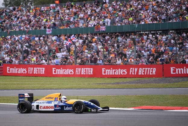 3rd July 2022, Silverstone Circuit, Silverstone, Northamptonshire, England: British F1 Grand Prix, Race day: Sebastian Vettel drives the car he owns and has had converted to carbon neutral fuel, previously driven by Nigel Mansell during the 1992 season when he won the F1 championship  ActionPlus12404490 SimonxWest