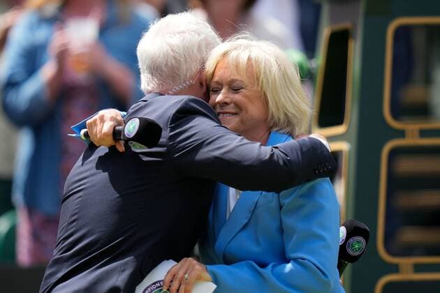 Mandatory Credit: Photo by Dave Shopland Shutterstock (13012855v) Sue Baker hugs John McEnroe on Centre Court as part of the centenary celebrations Wimbledon Tennis Championships, Day 7, The All England Lawn Tennis and Croquet Club, London, UK - 03 Jul 2022 Wimbledon Tennis Championships, Day 7, The All England Lawn Tennis and Croquet Club, London, UK - 03 Jul 2022  Copyright: xDavexShopland Shutterstockx 13012855v