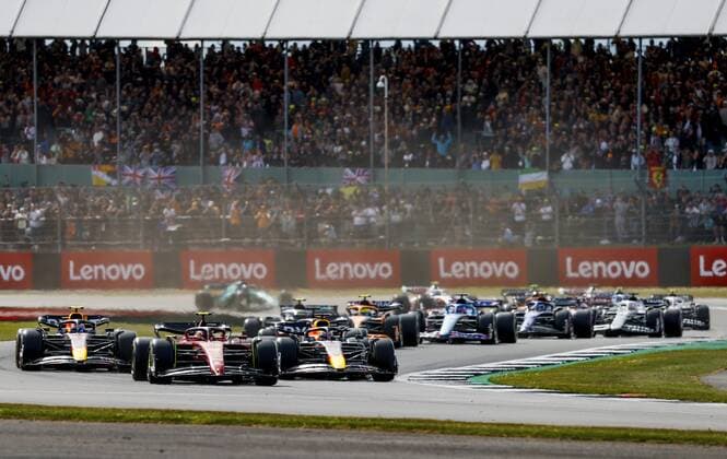 NORTHAMPTON - Sergio Perez (11) driving the Oracle Red Bull Racing RB18 Honda, Carlos Sainz (55) driving the Ferrari and Max Verstappen (1) driving the Oracle Red Bull Racing RB18 Honda during the F1 Grand Prix of Great Britain at Silverstone on July 3, 2022 in Northampton, England. REMKO DE WAAL F1 Grand Prix of Great Britain 2022 xVIxANPxSportx xxANPxIVx