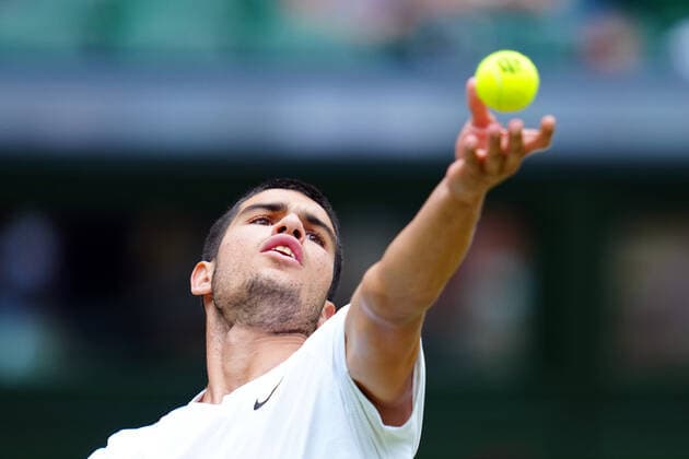 Mandatory Credit: Photo by James Veysey Shutterstock (13012857cp) Carlos Alcaraz during his fourth round match Wimbledon Tennis Championships, Day 7, The All England Lawn Tennis and Croquet Club, London, UK - 03 Jul 2022 Wimbledon Tennis Championships, Day 7, The All England Lawn Tennis and Croquet Club, London, UK - 03 Jul 2022  Copyright: xJamesxVeysey Shutterstockx 13012857cp