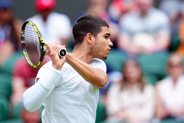Mandatory Credit: Photo by James Veysey Shutterstock (13012857cq) Carlos Alcaraz during his fourth round match Wimbledon Tennis Championships, Day 7, The All England Lawn Tennis and Croquet Club, London, UK - 03 Jul 2022 Wimbledon Tennis Championships, Day 7, The All England Lawn Tennis and Croquet Club, London, UK - 03 Jul 2022  Copyright: xJamesxVeysey Shutterstockx 13012857cq