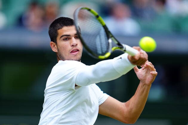 Mandatory Credit: Photo by James Veysey Shutterstock (13012857cr) Carlos Alcaraz during his fourth round match Wimbledon Tennis Championships, Day 7, The All England Lawn Tennis and Croquet Club, London, UK - 03 Jul 2022 Wimbledon Tennis Championships, Day 7, The All England Lawn Tennis and Croquet Club, London, UK - 03 Jul 2022  Copyright: xJamesxVeysey Shutterstockx 13012857cr