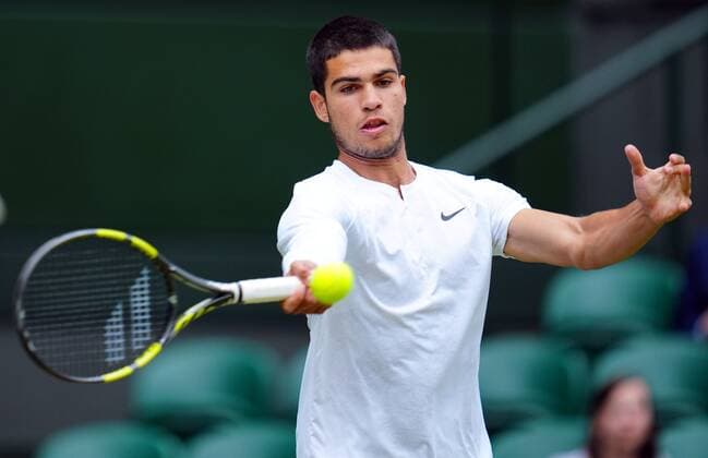 Mandatory Credit: Photo by James Veysey Shutterstock (13012857cz) Carlos Alcaraz during his fourth round match Wimbledon Tennis Championships, Day 7, The All England Lawn Tennis and Croquet Club, London, UK - 03 Jul 2022 Wimbledon Tennis Championships, Day 7, The All England Lawn Tennis and Croquet Club, London, UK - 03 Jul 2022  Copyright: xJamesxVeysey Shutterstockx 13012857cz