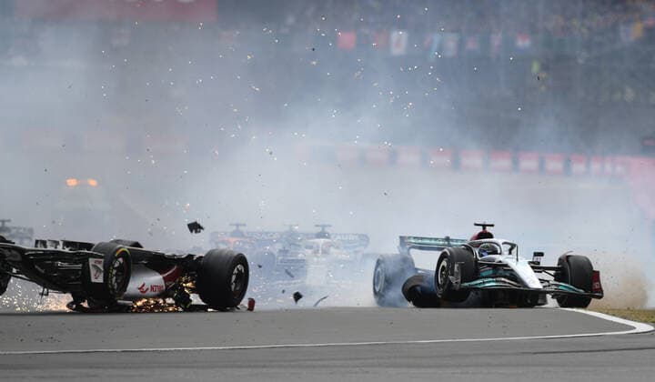 3rd July 2022, Silverstone Circuit, Silverstone, Northamptonshire, England: British F1 Grand Prix, Race day: Zhou Guanyu of China driving the (24) Alfa Romeo F1 C42 Ferrari is hit at the start and his car rolls, sliding upside down towards the barriers  ActionPlus12404616 SimonxWest