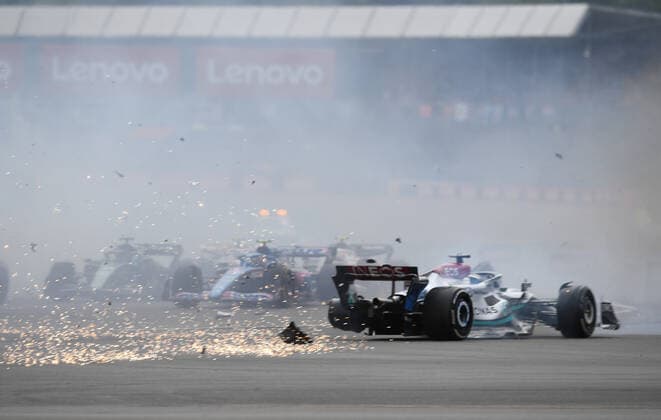 3rd July 2022, Silverstone Circuit, Silverstone, Northamptonshire, England: British F1 Grand Prix, Race day: George Russell of Great Britain driving the (63) Mercedes AMG Petronas F1 Team W13 hits debris and spins on lap 1  ActionPlus12404621 SimonxWest