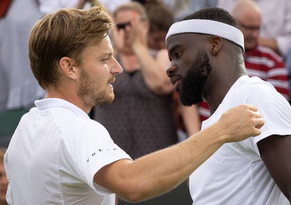 Belgian David Goffin and American Frances Tiafoe pictured after a tennis match between Belgian Goffin and US Tiafoe in the fourth round of the men s singles tournament at the 2022 Wimbledon grand slam tennis tournament at the All England Tennis Club, in south-west London, Britain, Sunday 03 July 2022. BENOITxDOPPAGNE  x36977713x