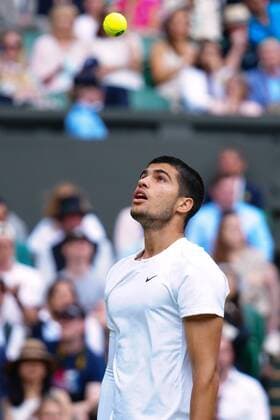 Mandatory Credit: Photo by Javier Garcia Shutterstock (13012857gr) Carlos Alcaraz during his fourth round match Wimbledon Tennis Championships, Day 7, The All England Lawn Tennis and Croquet Club, London, UK - 03 Jul 2022 Wimbledon Tennis Championships, Day 7, The All England Lawn Tennis and Croquet Club, London, UK - 03 Jul 2022  Copyright: xJavierxGarcia Shutterstockx 13012857gr
