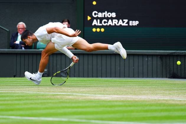 Mandatory Credit: Photo by Javier Garcia Shutterstock (13012857hc) Carlos Alcaraz during his fourth round match Wimbledon Tennis Championships, Day 7, The All England Lawn Tennis and Croquet Club, London, UK - 03 Jul 2022 Wimbledon Tennis Championships, Day 7, The All England Lawn Tennis and Croquet Club, London, UK - 03 Jul 2022  Copyright: xJavierxGarcia Shutterstockx 13012857hc