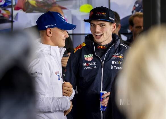 SILVERSTONE - Max Verstappen (Oracle Red Bull Racing) talks to Mick Schumacher (Haas) after the F1 Grand Prix of Great Britain at Silverstone on July 3, 2022 in Silverstone, England. REMKO DE WAAL F1 Grand Prix of Great Britain 2022 xVIxANPxSportx xxANPxIVx