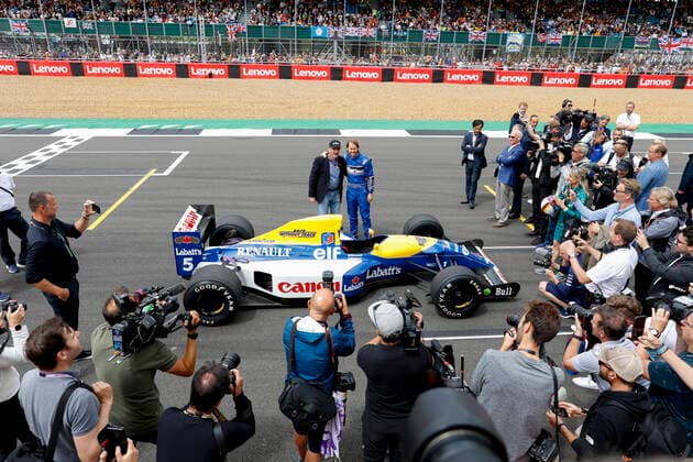 5 Sebastian Vettel (DEU, Aston Martin Aramco Cognizant F1 Team) and the 1992 Williams FW14 of Nigel Mansell, F1 Grand Prix of Great Britain at Silverstone Circuit on July 3, 2022 in Silverstone, United Kingdom. (Photo by HOCH ZWEI) Silverstone United Kingdom
