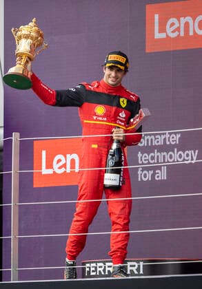 3rd July 2022, Silverstone Circuit, Silverstone, Northamptonshire, England: British F1 Grand Prix, Race day: Scuderia Ferrari driver Carlos Sainz Jr celebrates the win with his trophy  ActionPlus12404777 TimxWilliams