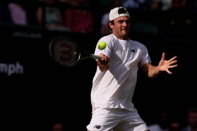 3rd July 2022, All England Lawn Tennis and Croquet Club, London, England; Wimbledon Tennis tournament; Tommy Paul plays a forehand to Cameron Norrie in the mens singles  ActionPlus12404793 ShaunxBrooks