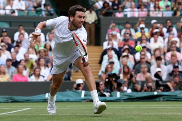 3rd July 2022, All England Lawn Tennis and Croquet Club, London, England; Wimbledon Tennis tournament; Cameron Norrie plays a volley to Tommy Paul in the mens singles  ActionPlus12404804 ShaunxBrooks