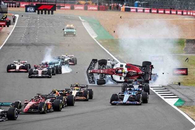 Crash between 24 Guanyu Zhou (CHN, Alfa Romeo F1 Team ORLEN) and 63 George Russell (GBR, Mercedes-AMG Petronas F1 Team) at the start, F1 Grand Prix of Great Britain at Silverstone Circuit on July 3, 2022 in Silverstone, United Kingdom. (Photo by HOCH ZWEI) Silverstone United Kingdom