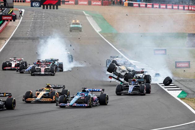 Crash between 24 Guanyu Zhou (CHN, Alfa Romeo F1 Team ORLEN) and 63 George Russell (GBR, Mercedes-AMG Petronas F1 Team) at the start, F1 Grand Prix of Great Britain at Silverstone Circuit on July 3, 2022 in Silverstone, United Kingdom. (Photo by HOCH ZWEI) Silverstone United Kingdom