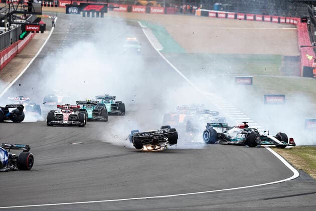 Crash between 24 Guanyu Zhou (CHN, Alfa Romeo F1 Team ORLEN) and 63 George Russell (GBR, Mercedes-AMG Petronas F1 Team) at the start, F1 Grand Prix of Great Britain at Silverstone Circuit on July 3, 2022 in Silverstone, United Kingdom. (Photo by HOCH ZWEI) Silverstone United Kingdom