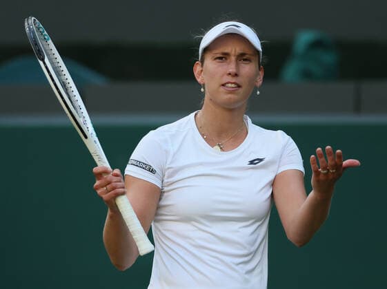 Belgian Elise Mertens reacts during a tennis match between Belgian Mertens and Tunisian Jabeur, in the fourth round of the women s singles tournament at the 2022 Wimbledon grand slam tennis tournament at the All England Tennis Club, in south-west London, Britain, Sunday 03 July 2022. BENOITxDOPPAGNE  x36979988x